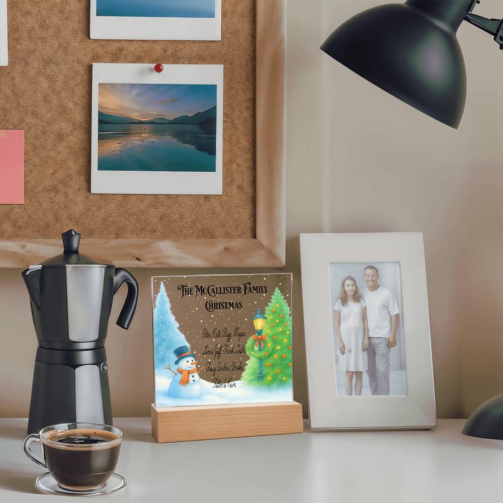 Café au lait with a decorative sign and photo frame on a table.